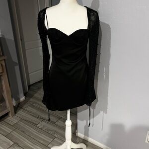 Black Oh Polly Dress
New With Tags and still in Bag